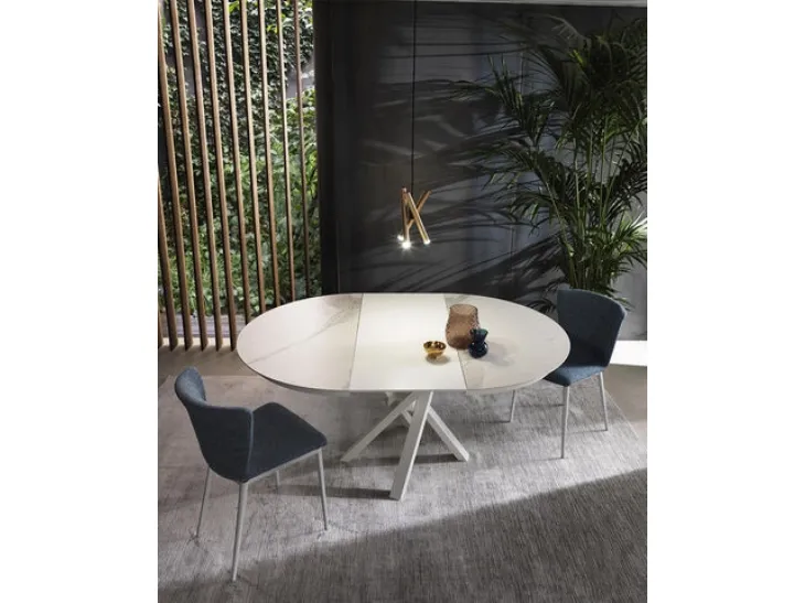 Tavolo allungabile Shangai Round con top in ceramica e base in alluminio verniciato di Riflessi